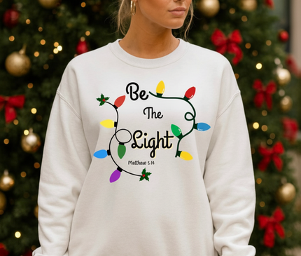 BE THE LIGHT UNISEX CREWNECK SWEATSHIRT